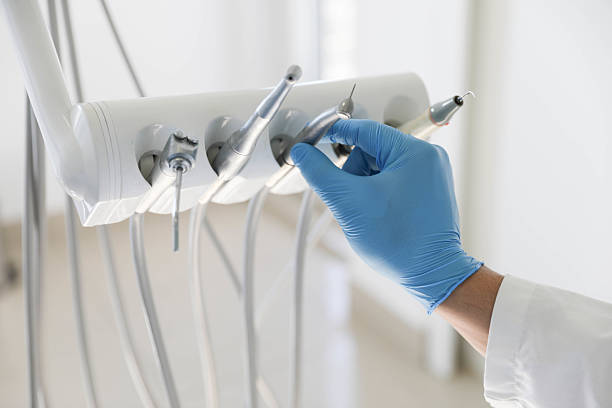 Professional Tooth Extraction technician working in Overland Park, KS